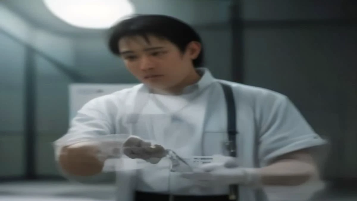 Photograph: wide establishing shot of a quality inspector in a clean facility holding a magnifier over a manufactured part, soft morning light